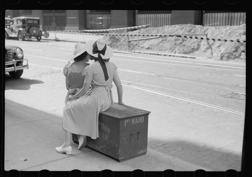 Girls waiting for street car, Chicago, Illinois