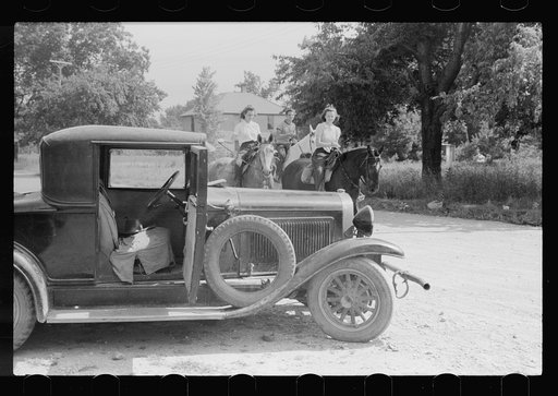 Untitled photo, possibly related to: Migrants getting car ready to move on in search for work, Berrien County, Michigan