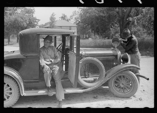 Migrants getting car ready to move on in search for work, Berrien County, Michigan