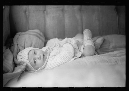 Baby in back seat of migrant workers' automobile, Berrien County, Michigan
