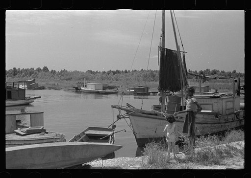 Fishing boats that have helped provide a supplementary income for many of the former sugarcane growers in this section of Louisiana