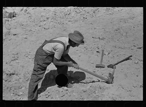 Untitled photo, possibly related to: Farmers who have been resettled at Skyline Farms, at work in sand pit