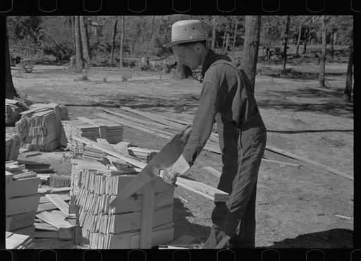 Untitled photo, possibly related to: Cutting wood for shingles, Jackson County, Alabama