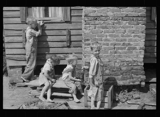 Children of resettled farmer who has been moved into a new house, Wolf Creek Farms, Grady County, Georgia