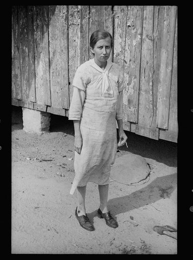 Untitled photo, possibly related to: Daughter of sharecropper, Wilmington, North Carolina. Mother and another child in background