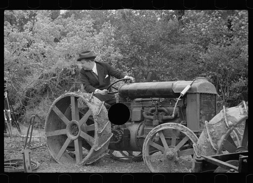 Untitled photo, possibly related to: Commissioner Allen operating tractor, Berwyn, Maryland