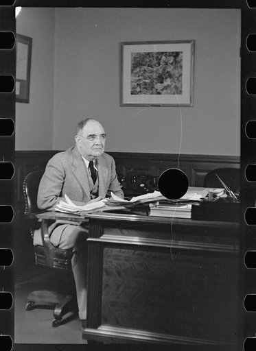 Untitled photo, possibly related to: Dr. Alexander, assistant to the administrator of the U.S. Resettlement Administration, Washington, D.C.