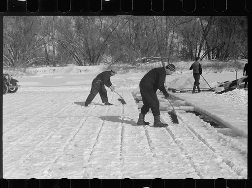 Untitled photo, possibly related to: Cutting ice on the Ottaquetchee River, Coos County, New Hampshire