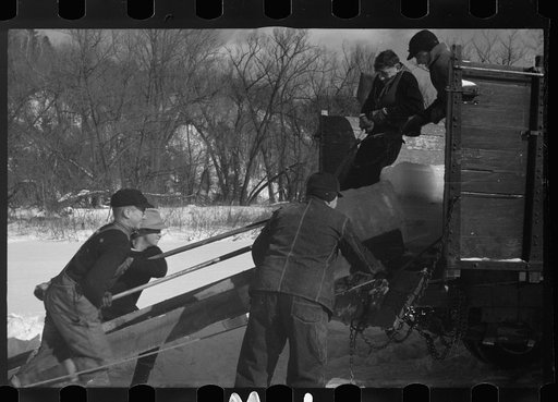 Loading river ice on truck, Coos County, New Hampshire