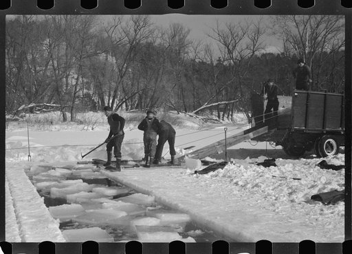 Untitled photo, possibly related to: Cutting ice on the Ottaquetchee River, Coos County, New Hampshire