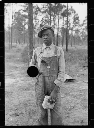 Untitled photo, possibly related to: Negro boy selling pecans by road, near Alma, Georgia