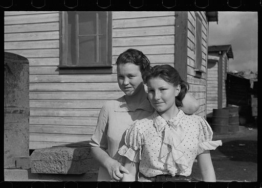 Daughters of a migratory family who are now working in the packinghouse at Belle Glade, Florida