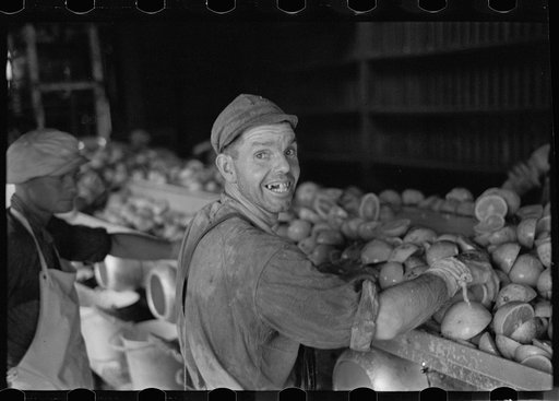 An employee of the grapefruit canning plant at Winter Haven, Florida