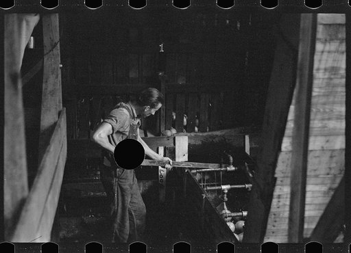 Untitled photo, possibly related to: An employee of the grapefruit canning plant at Winter Haven, Florida