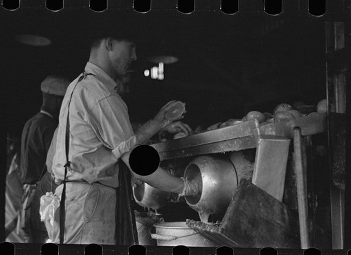 Untitled photo, possibly related to: An employee of the grapefruit canning plant at Winter Haven, Florida