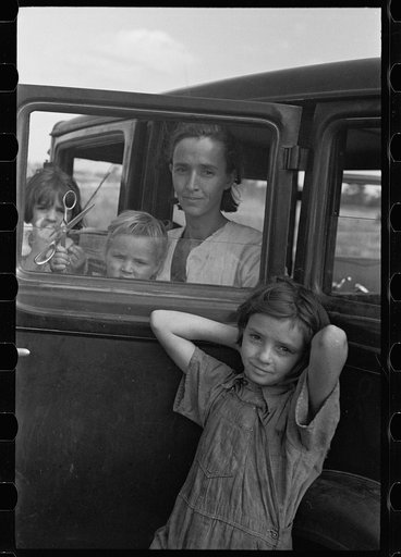 Untitled photo, possibly related to: The family of a migratory fruit worker from Tennessee now camped in a field near the packinghouse at Winter Haven, Florida
