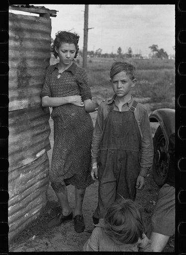 Part of the family of a migrant fruit worker from Tennessee, camped near the packinghouse in Winter Haven, Florida