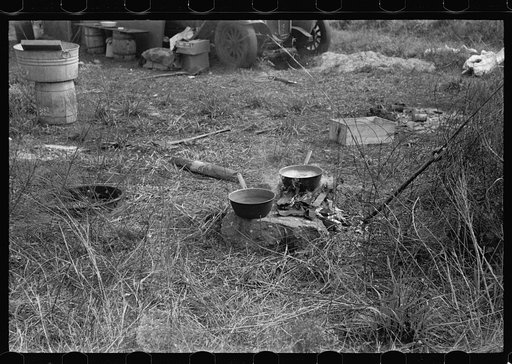 Cooking facilities for a migrant fruit working family encamped near Winter Haven, Florida