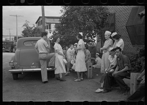 Untitled photo, possibly related to: Workers in canning plant during change of shift. Many of these are migratory. Polk County, Florida