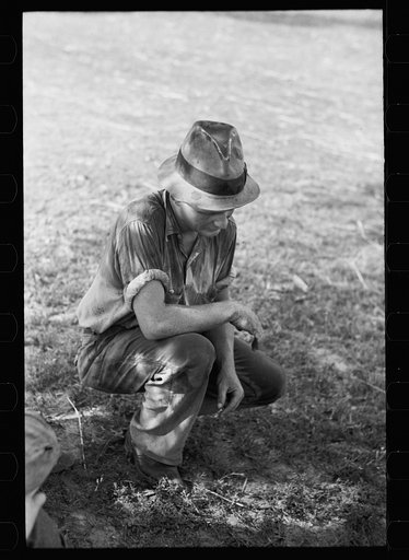 Untitled photo, possibly related to: Threshing hand taking a drink, Frederick County, Maryland