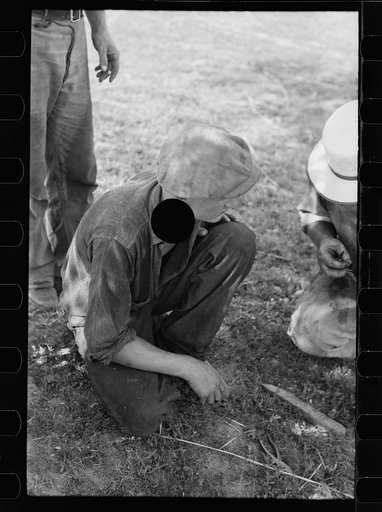 Untitled photo, possibly related to: Threshing hand taking a drink, Frederick County, Maryland