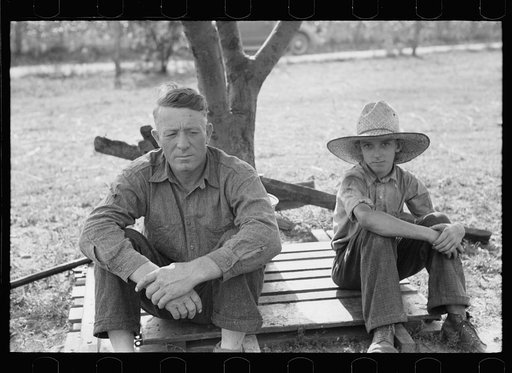 Untitled photo, possibly related to: Part of threshing crew taking a rest, Frederick, Maryland
