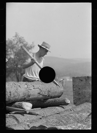 Untitled photo, possibly related to: Lumber mill worker, Lowell, Vermont