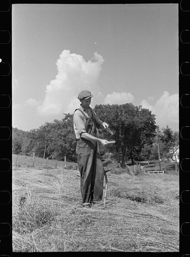 Untitled photo, possibly related to: Sharpening a scythe, Windsor County, Vermont