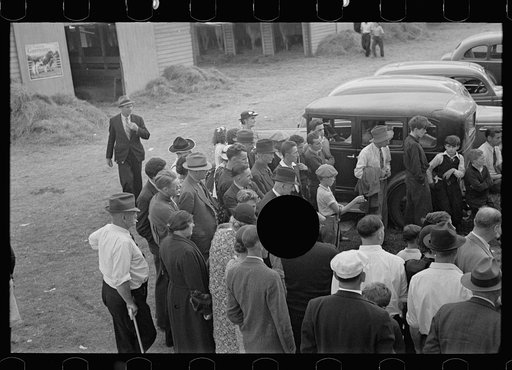 Untitled photo, possibly related to: Rutland, Vermont. Watching the medicine man at the Vermont State Fair