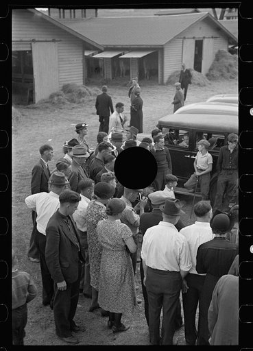 Untitled photo, possibly related to: Rutland, Vermont. Watching the medicine man at the Vermont State Fair