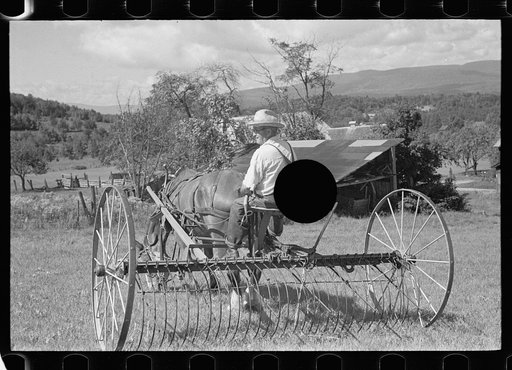 Untitled photo, possibly related to: Frank Kinney on a hay rake, Eden Mills, Vermont