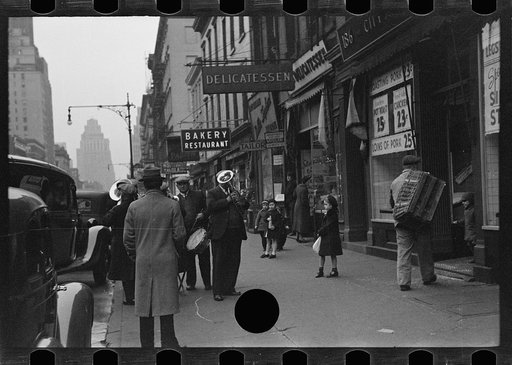 Street band on sidewalk, Eighth Avenue looking north from between West 19th and 20th Streets, New York, New York