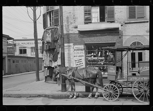 Pawnshop and milk wagon, Québec, Canada