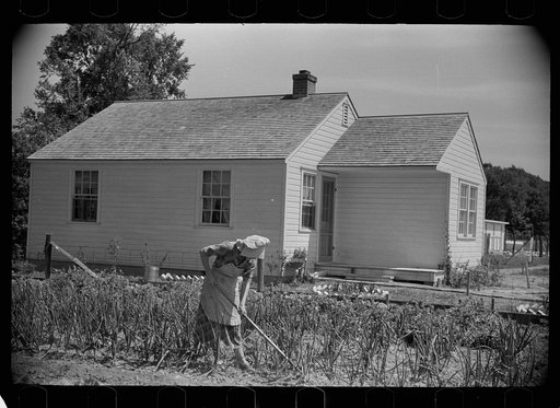 Wife of homesteader in garden, Scioto Farms, Ohio