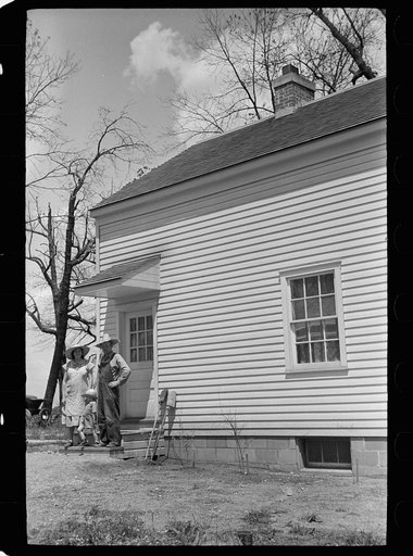 Farm family on steps of house, Scioto Farms, Ohio