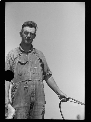 Untitled photo, possibly related to: Farmer and child, Scioto Farms, Ohio