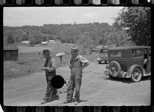 Untitled photo, possibly related to: Resting in front of general store, Blankenship, Martin County, Indiana