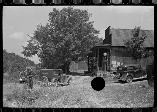 Untitled photo, possibly related to: Resting in front of general store, Blankenship, Martin County, Indiana