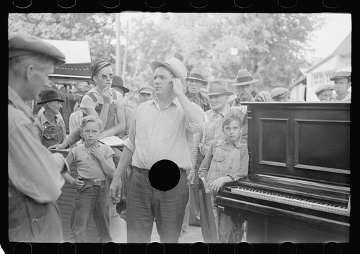 Untitled photo, possibly related to: Auction sales in Greene County are frequent because as farm conditions became worse families move into smaller houses and sell excess furniture. Owensburg, Indiana
