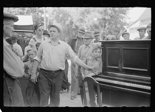 Auction sales in Greene County are frequent because as farm conditions became worse families move into smaller houses and sell excess furniture. Owensburg, Indiana