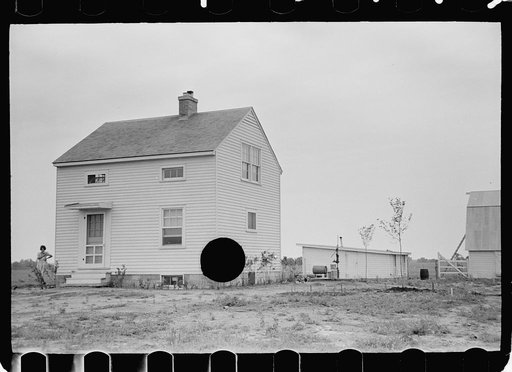 Untitled photo, possibly related to: Part-time farmer who works in Loogootee with his family, Wabash Farms, Indiana