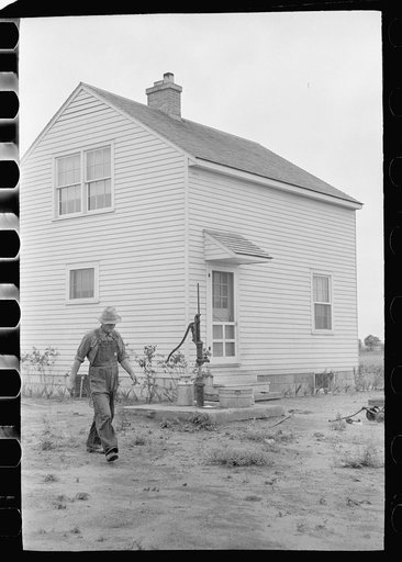 Untitled photo, possibly related to: Part-time farmer who works in Loogootee with his family, Wabash Farms, Indiana