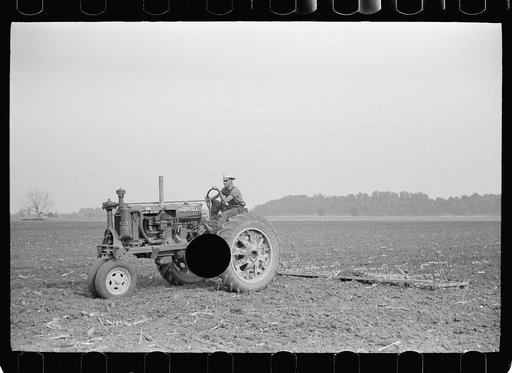 Untitled photo, possibly related to: Tractors used in cultivation, Wabash Farms, Indiana