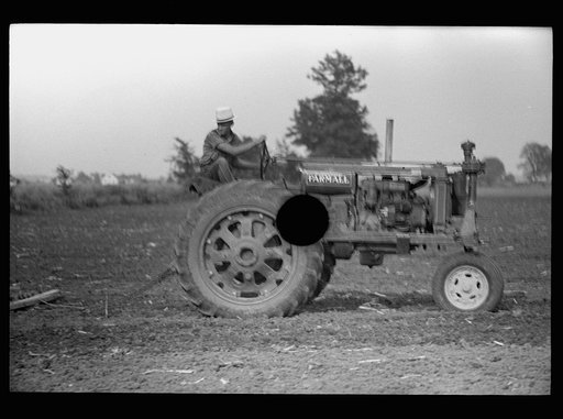 Untitled photo, possibly related to: Tractors used in cultivation, Wabash Farms, Indiana