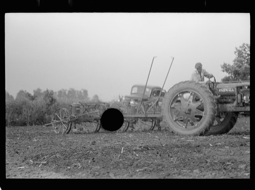 Untitled photo, possibly related to: Tractors used in cultivation, Wabash Farms, Indiana