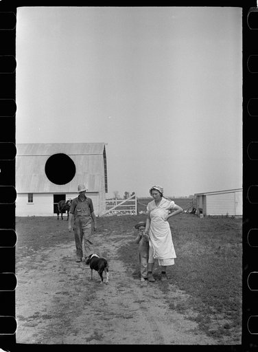 Untitled photo, possibly related to: Resettled farmer on steps of new home, Wabash Farms, Indiana