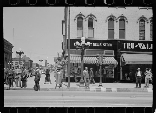 Untitled photo, possibly related to: Sign across main street, Peoria, Illinois