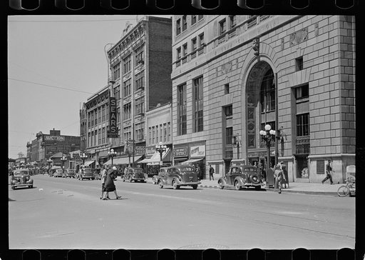Untitled photo, possibly related to: Sign across main street, Peoria, Illinois