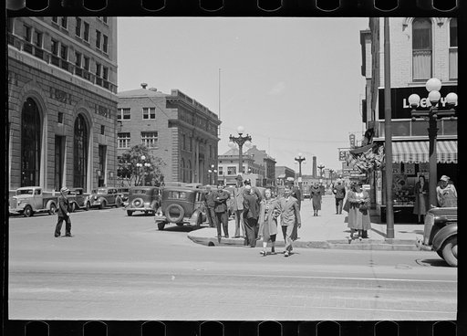 Untitled photo, possibly related to: Sign across main street, Peoria, Illinois