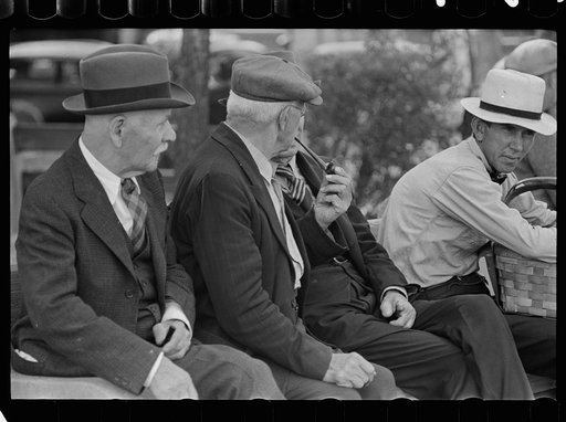 Untitled photo, possibly related to: Men in park, Peoria, Illinois